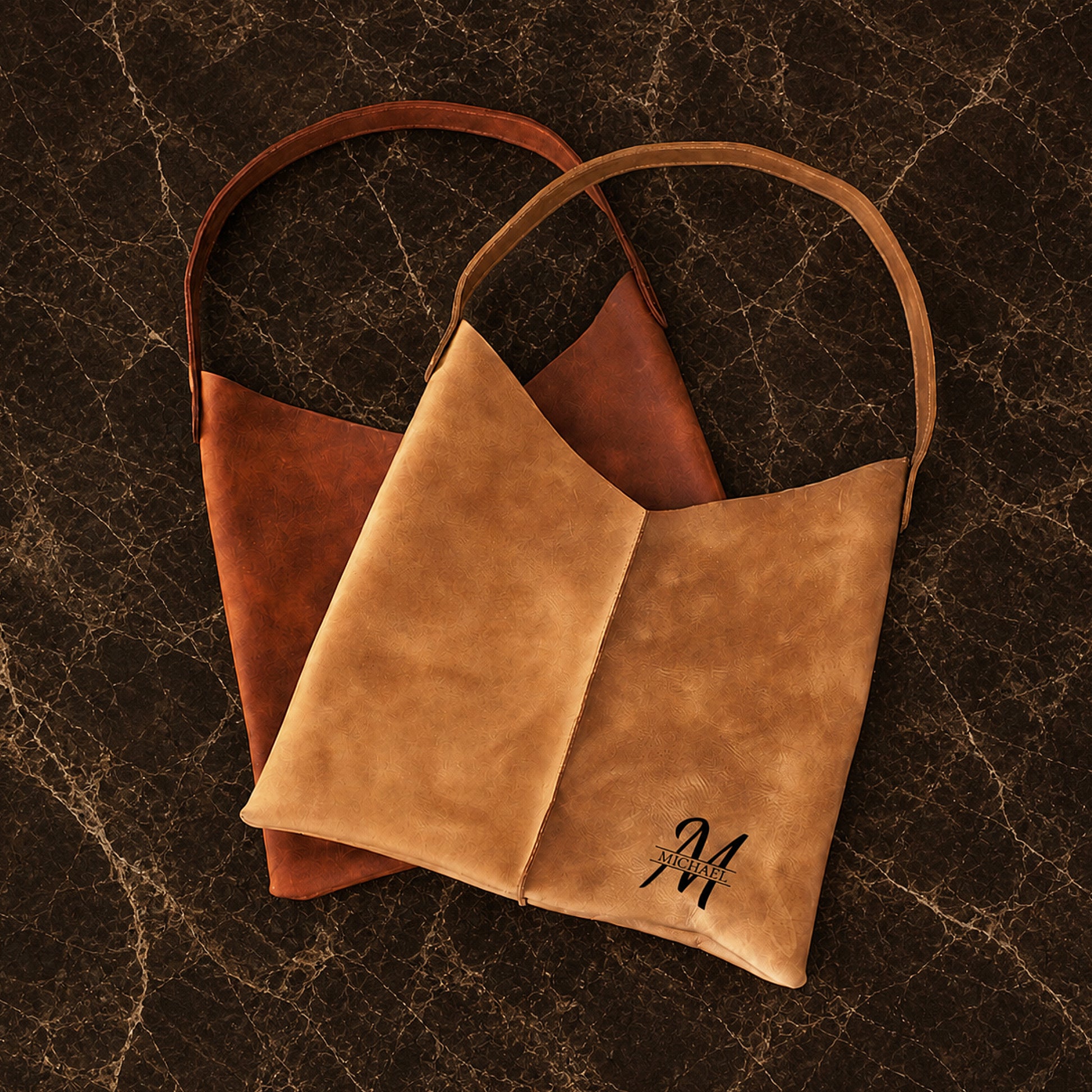 Leather tote bag zipper and closure detail, durable brass hardware