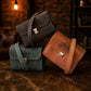 Leather camera bag with custom name, worn crossbody in natural light