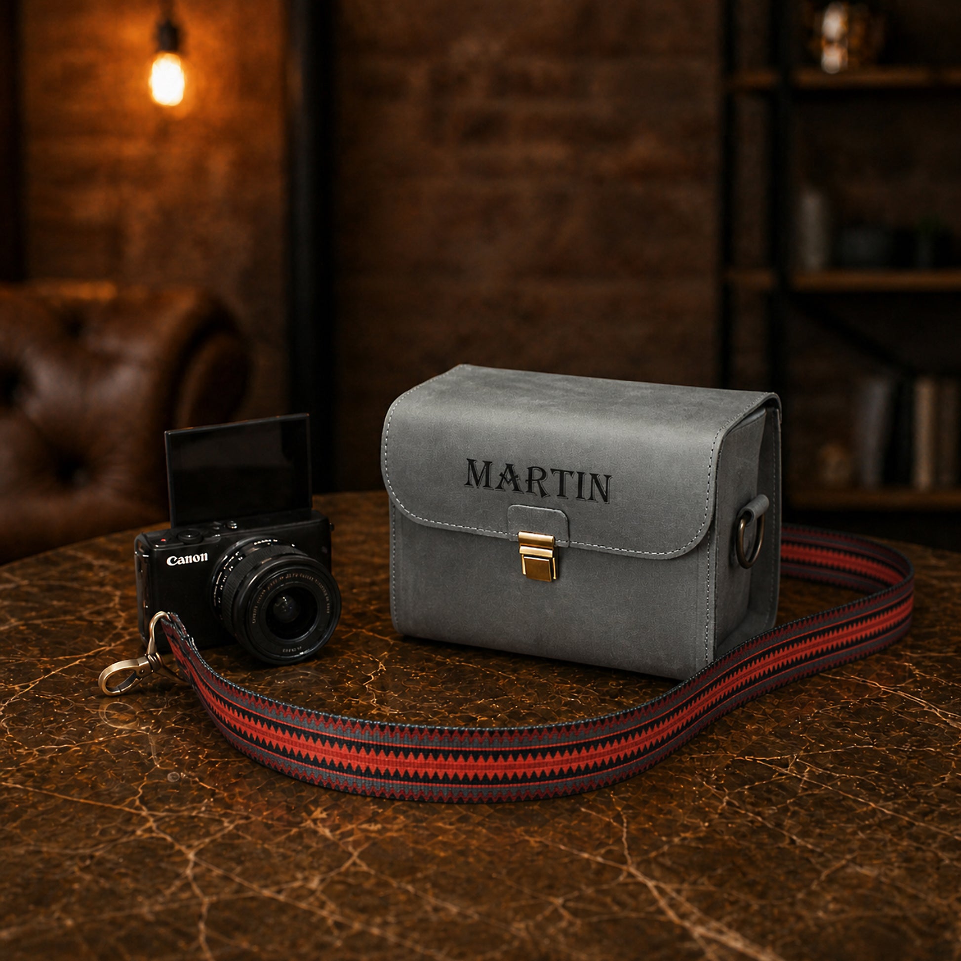 Personalized leather bags with names, flat lay on dark background