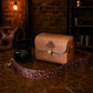 Personalized leather camera bag as a gift, elegant packaging detail