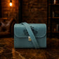 Personalized monogram engraving on handcrafted leather camera bag