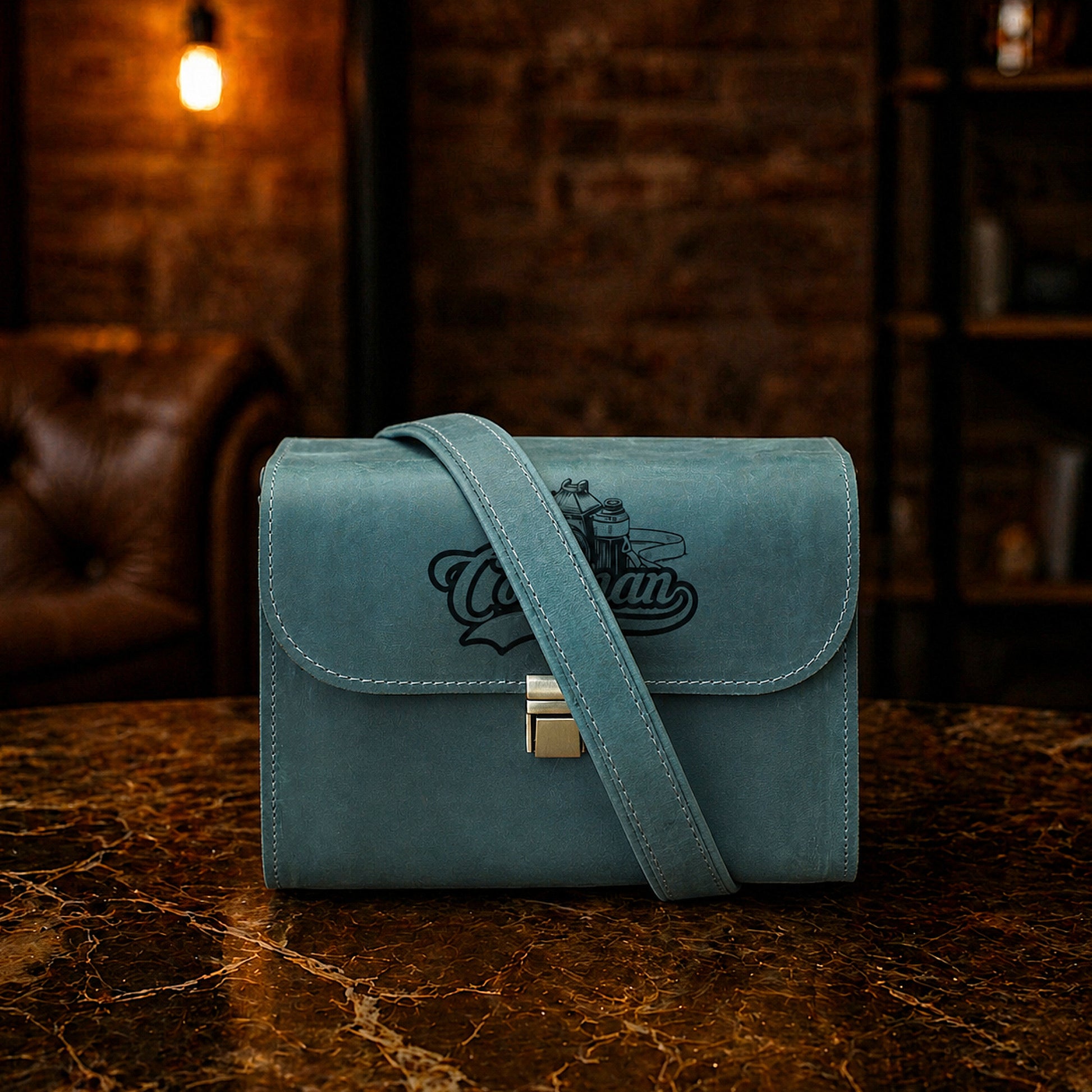 Personalized monogram engraving on handcrafted leather camera bag