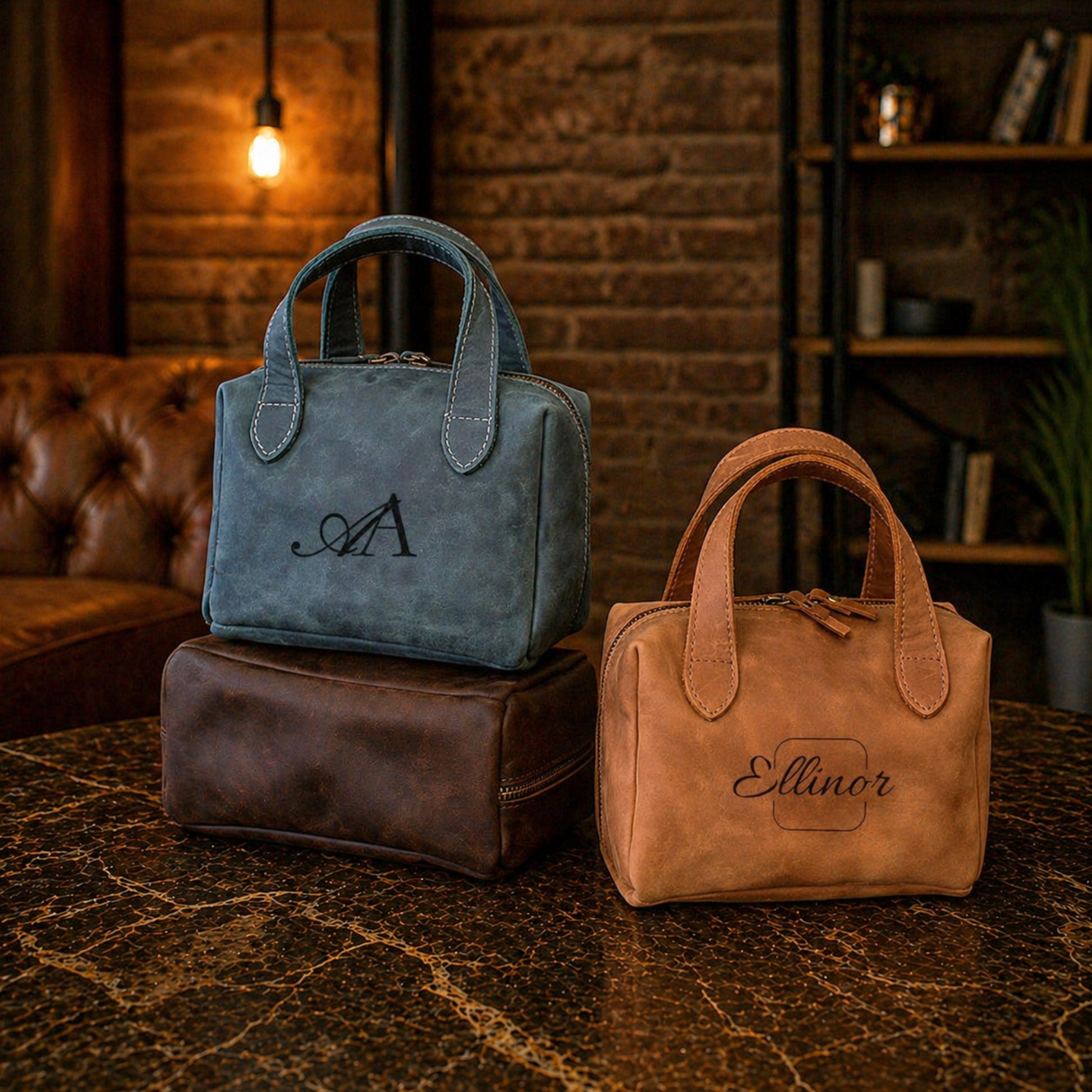 Two leather handbags, one blue and one brown, with visible branding, on a textured surface.