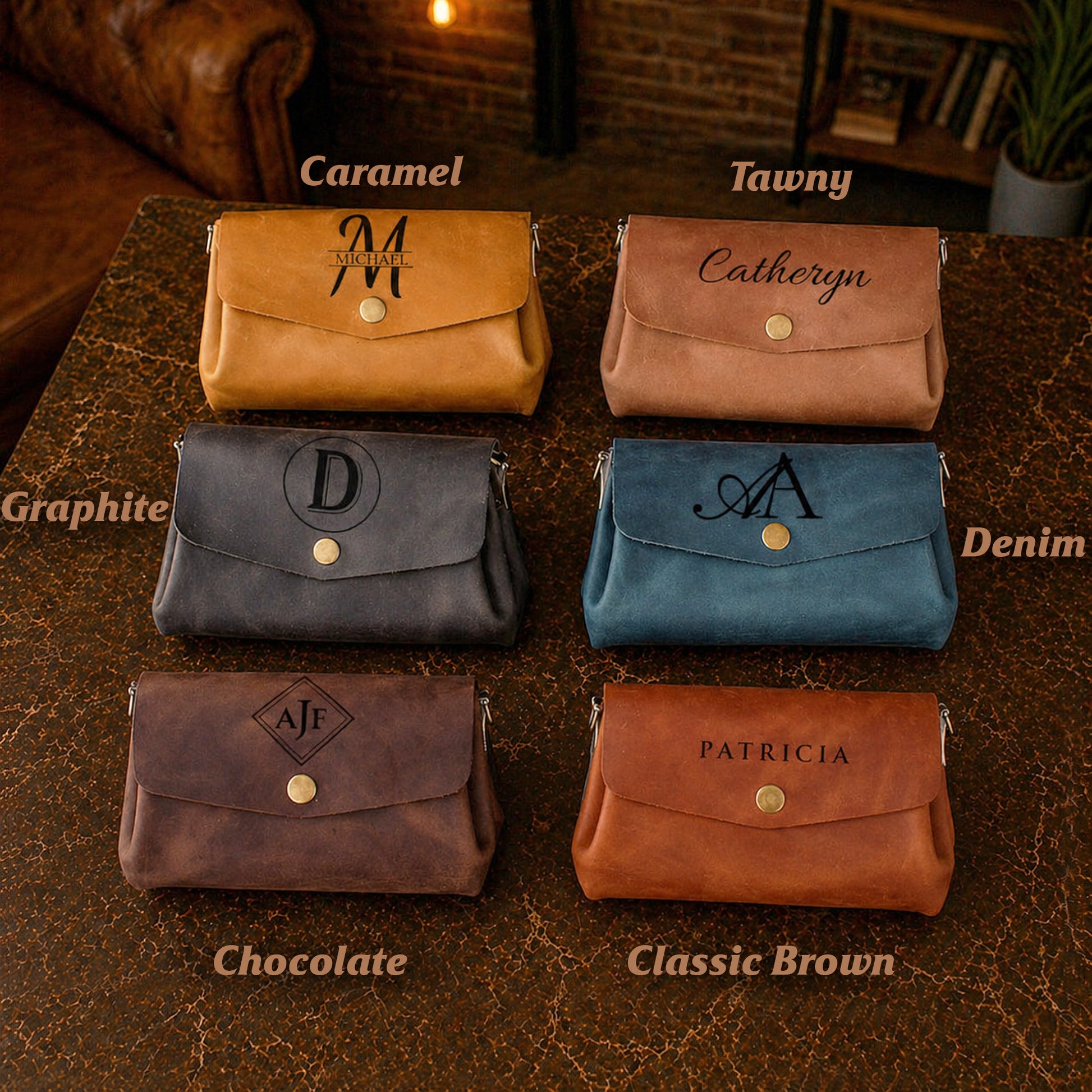 Collection of leather pouches in various colors with personalized names on a textured surface.